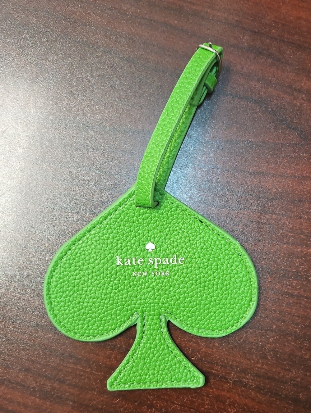 kate spade bright green spade-shaped luggage tag